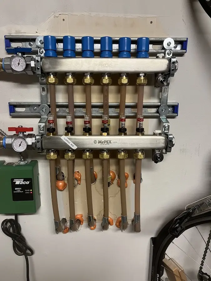 Plumber performing Gas Line Installation at a residential property in Bear Creek